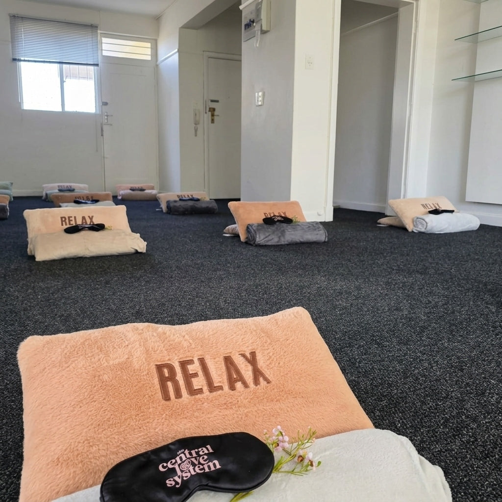 Relaxation mats with RELAX pillows and The Central Love System eye masks